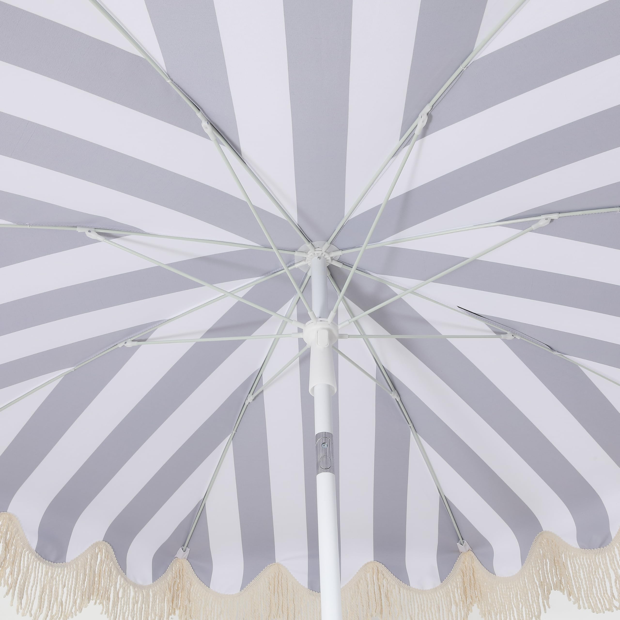 JONATHAN Y umbrella in a patio lifestyle scene showing how the design complements outdoor decor