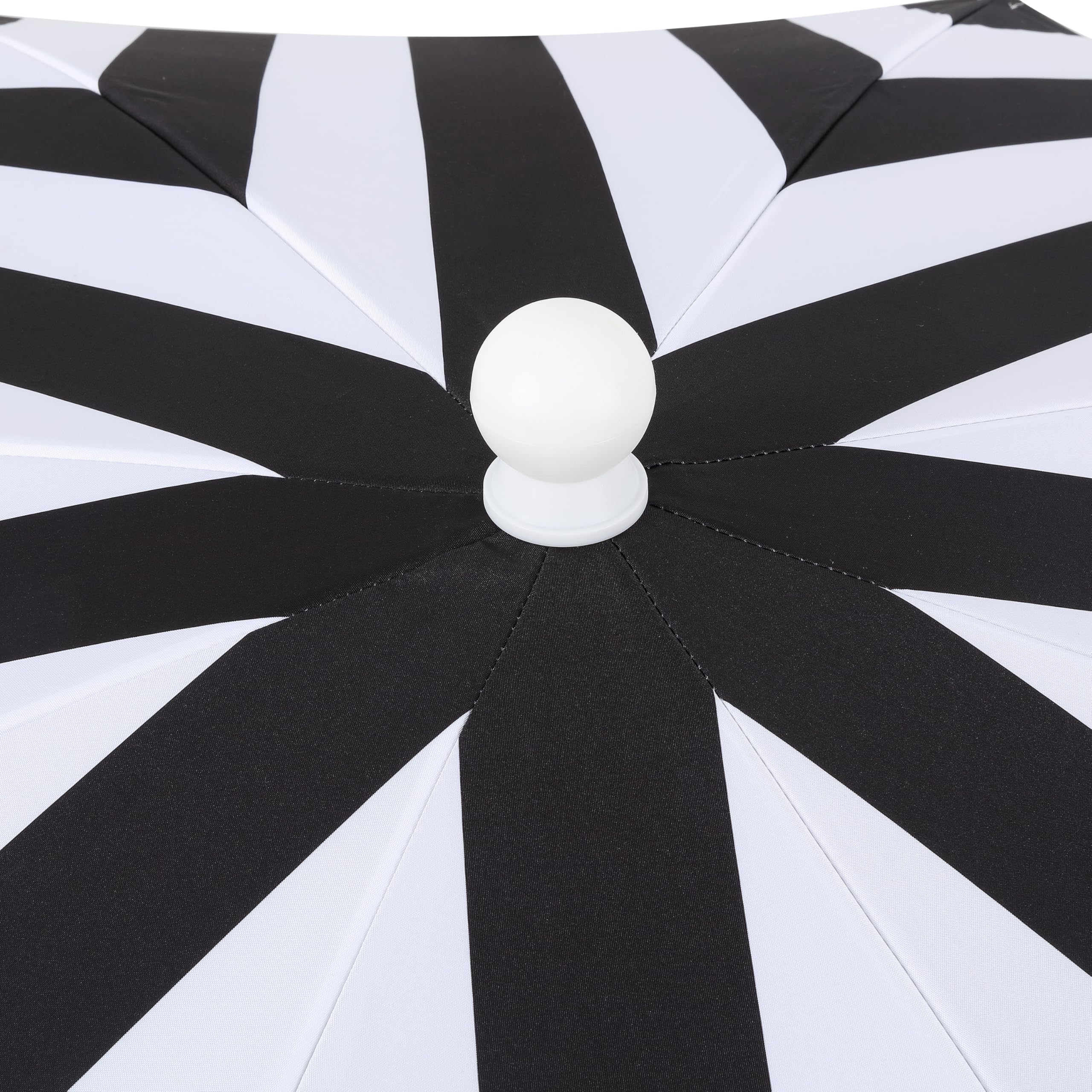 JONATHAN Y umbrella next to a beach chair for scale illustrating canopy size and seating coverage