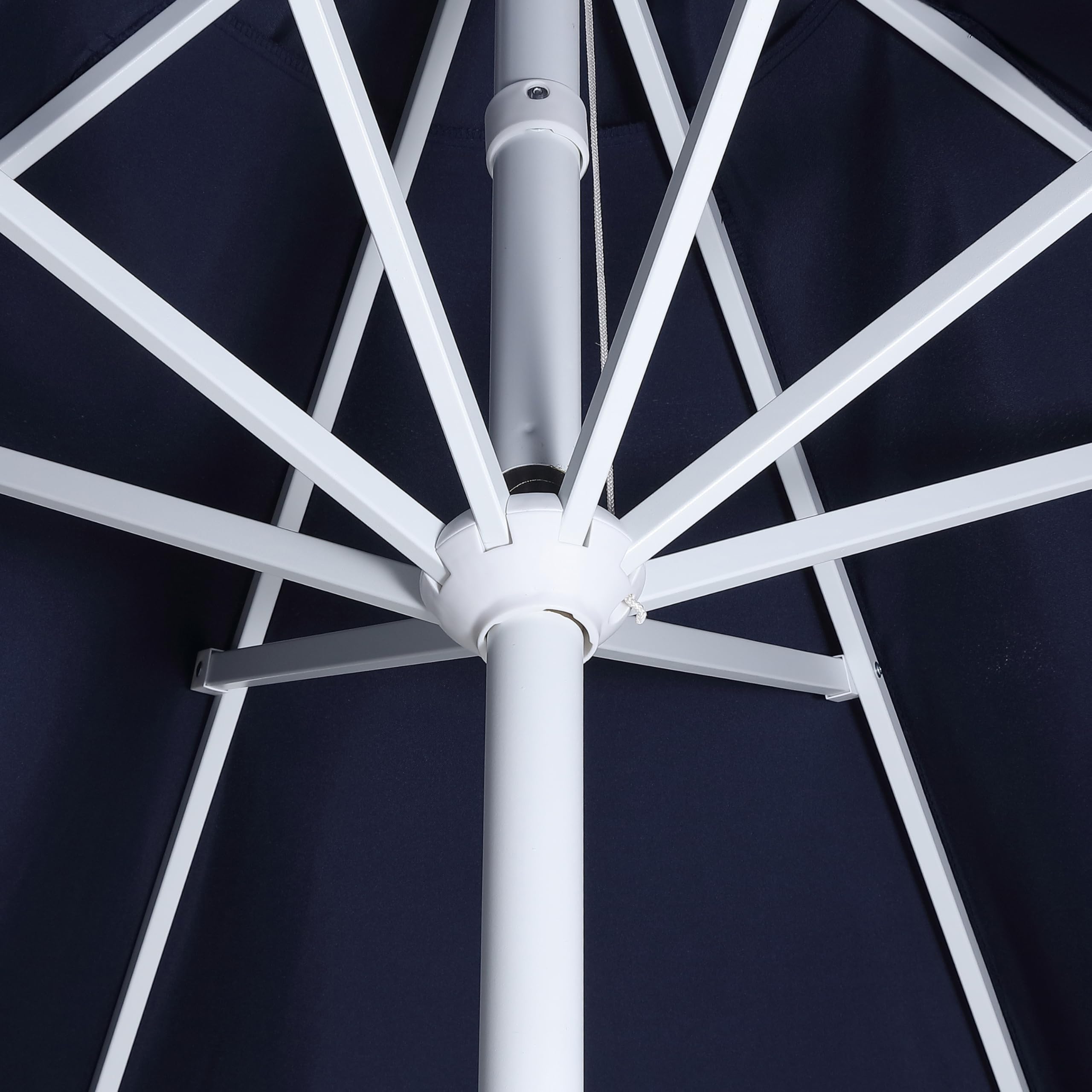 JONATHAN Y umbrella in a backyard scene conveying stylish summer protection