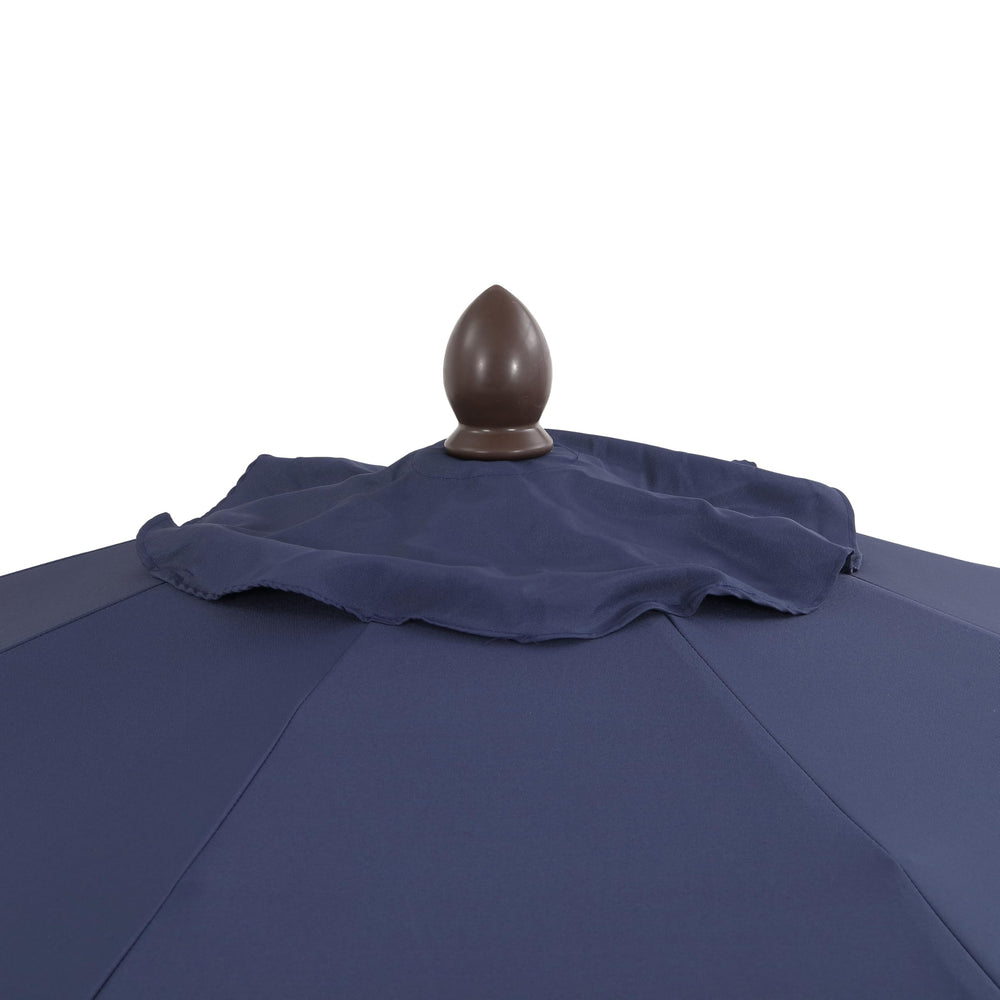 JONATHAN Y umbrella next to lounge chairs illustrating 9-foot coverage