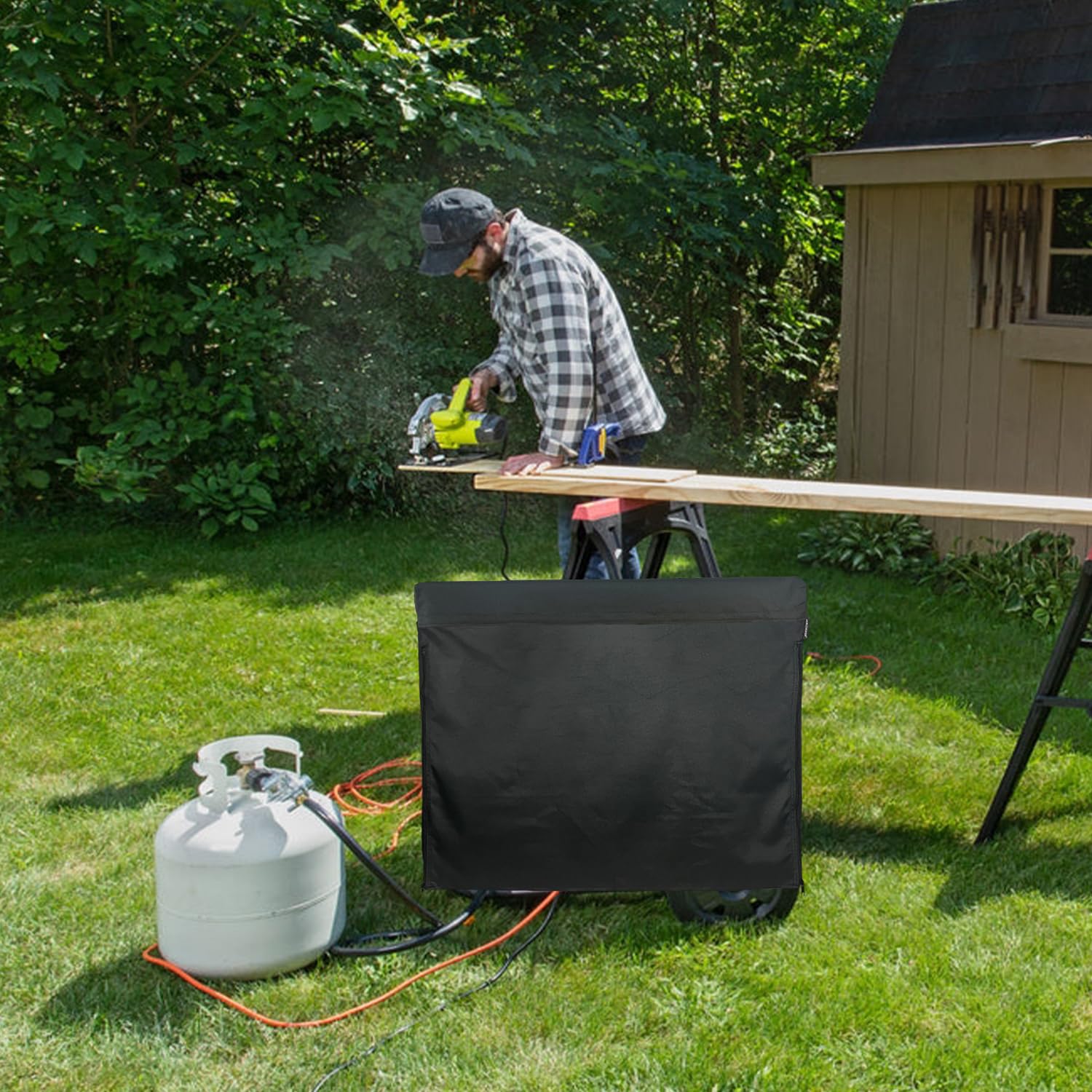 Jorohiker in outdoor storm setting protecting generator from rain and snow