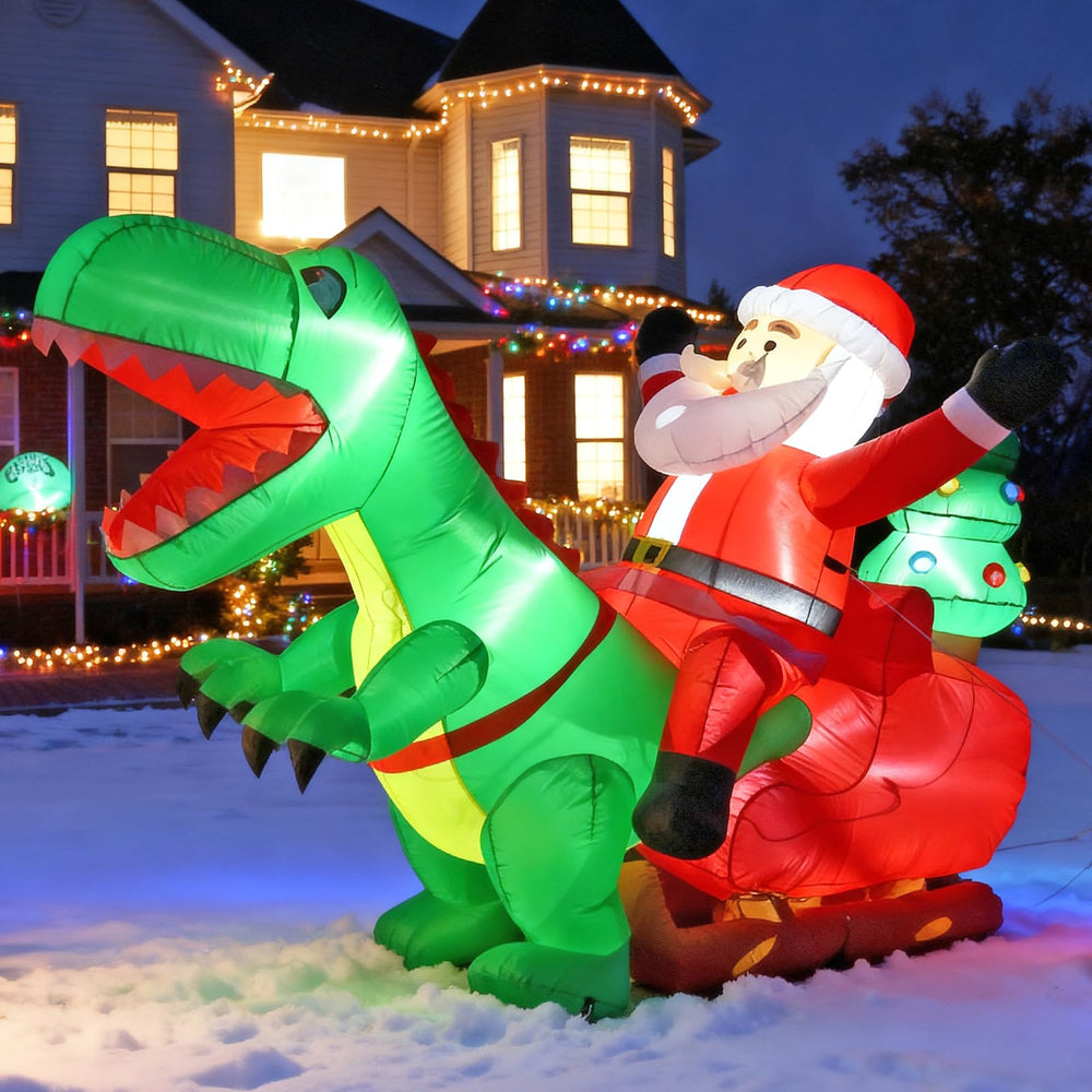 joyhalo front view showing full Santa riding dinosaur inflatable and festivity
