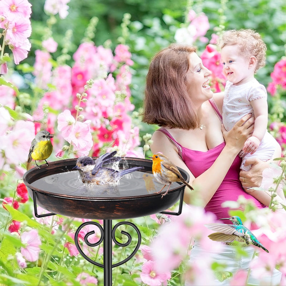jsyonii bird bath in garden lifestyle scene adding charm and drawing wildlife