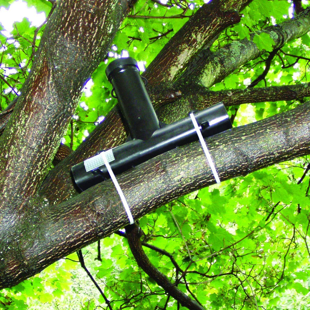 JT Eaton bait station placed in garden demonstrating discreet landscape placement