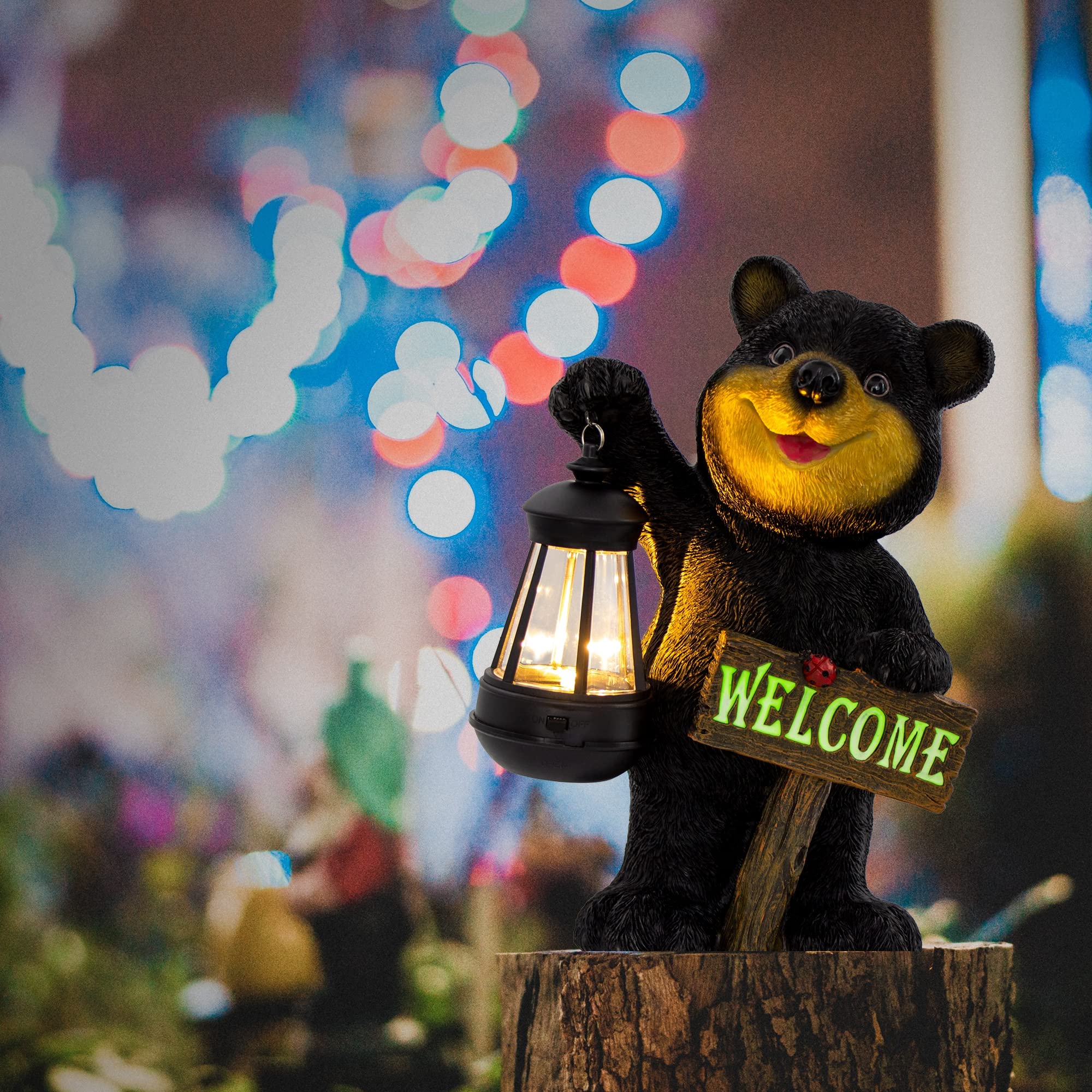 Juegoal statue night glow illuminating yard with soft light
