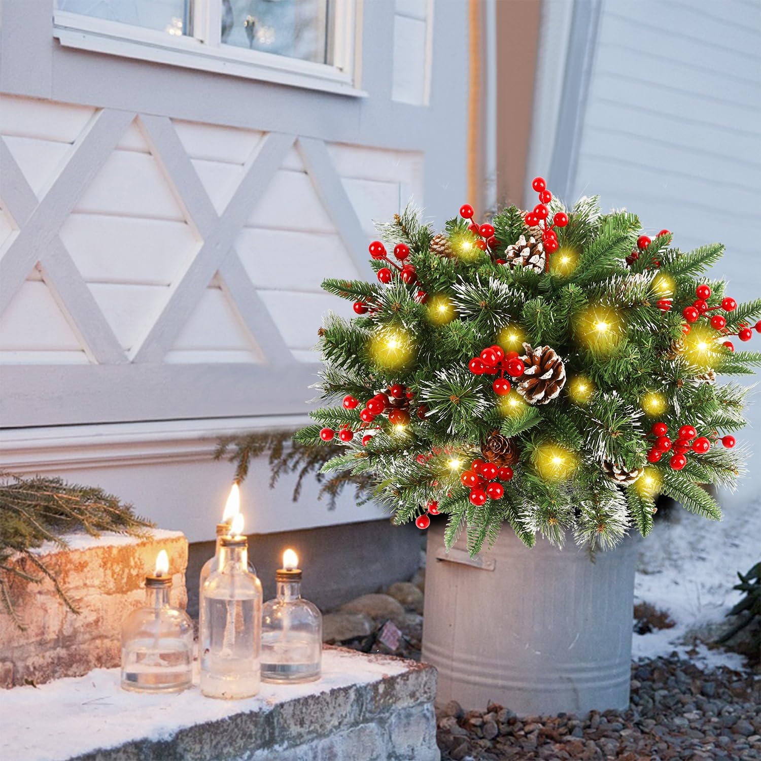 Juegoal tree planted in porch pot demonstrating cordless setup and instant holiday curb appeal