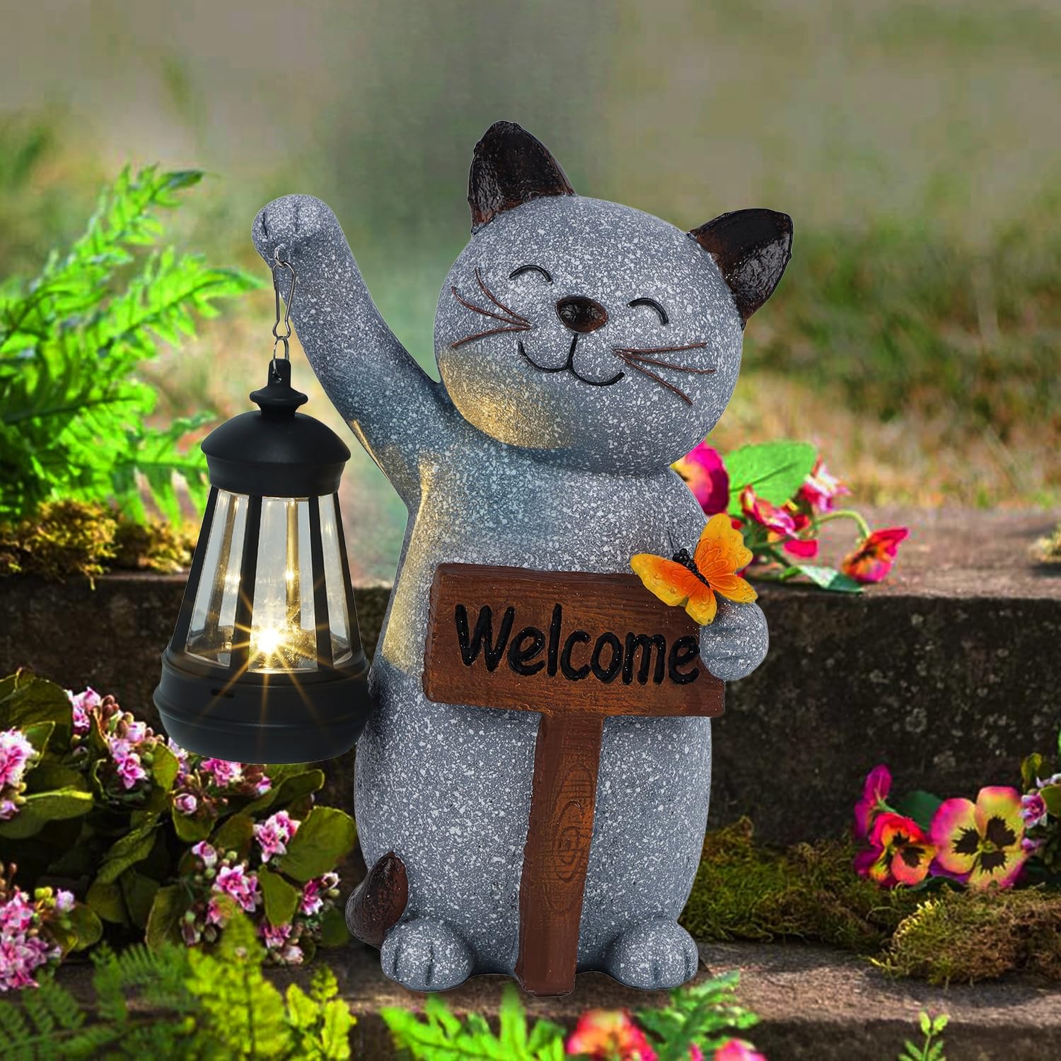 Juegoal kitten nestled in flower bed brightens garden scenes