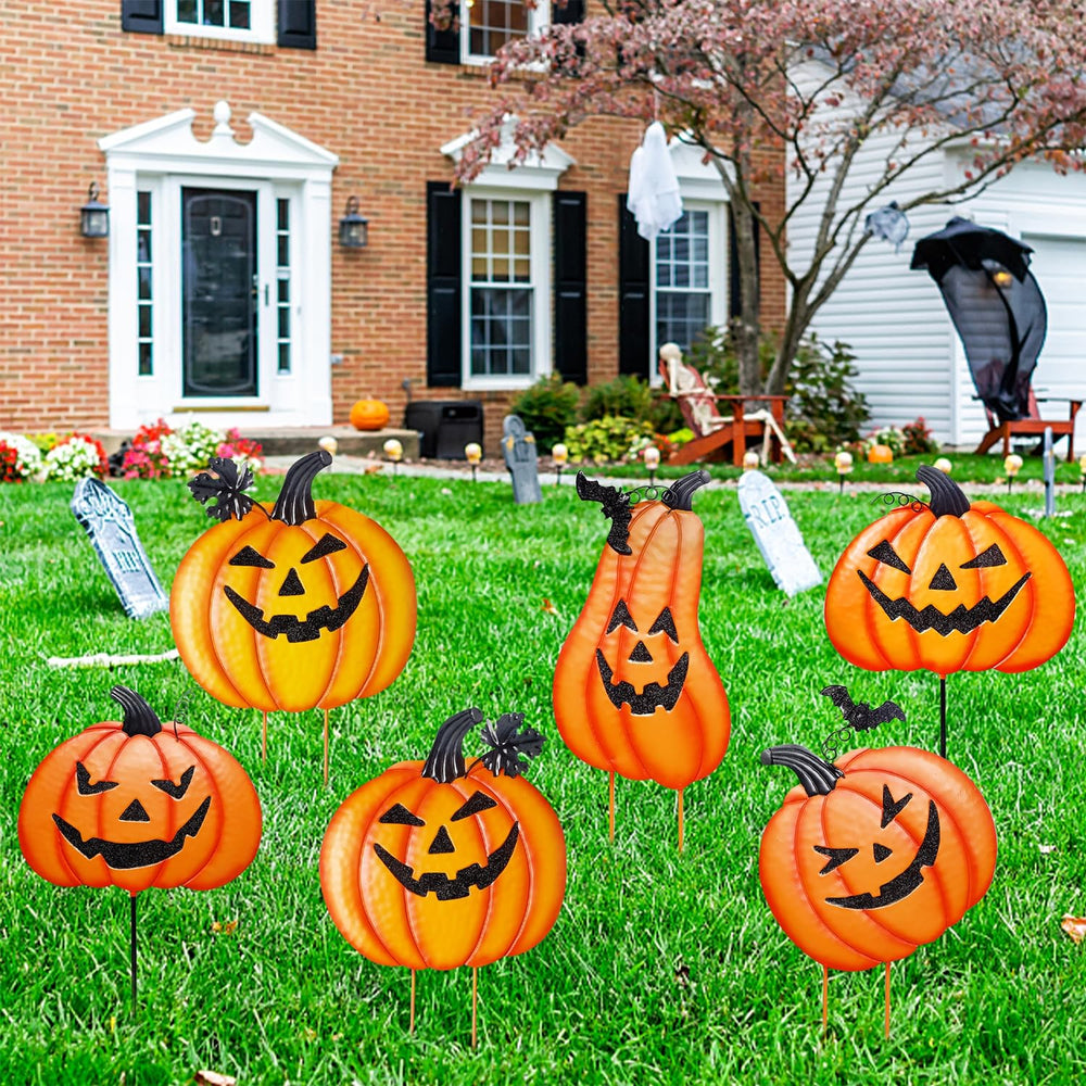 Juegoal stacked pumpkins on porch with fall props showing seasonal styling