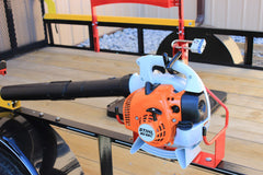 Jungle Jim's blower holder with handheld blower installed for quick access