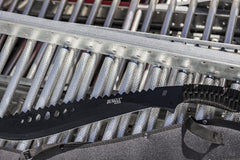 Jungle Master cord-wrapped handle detail offering secure grip and emergency cord use