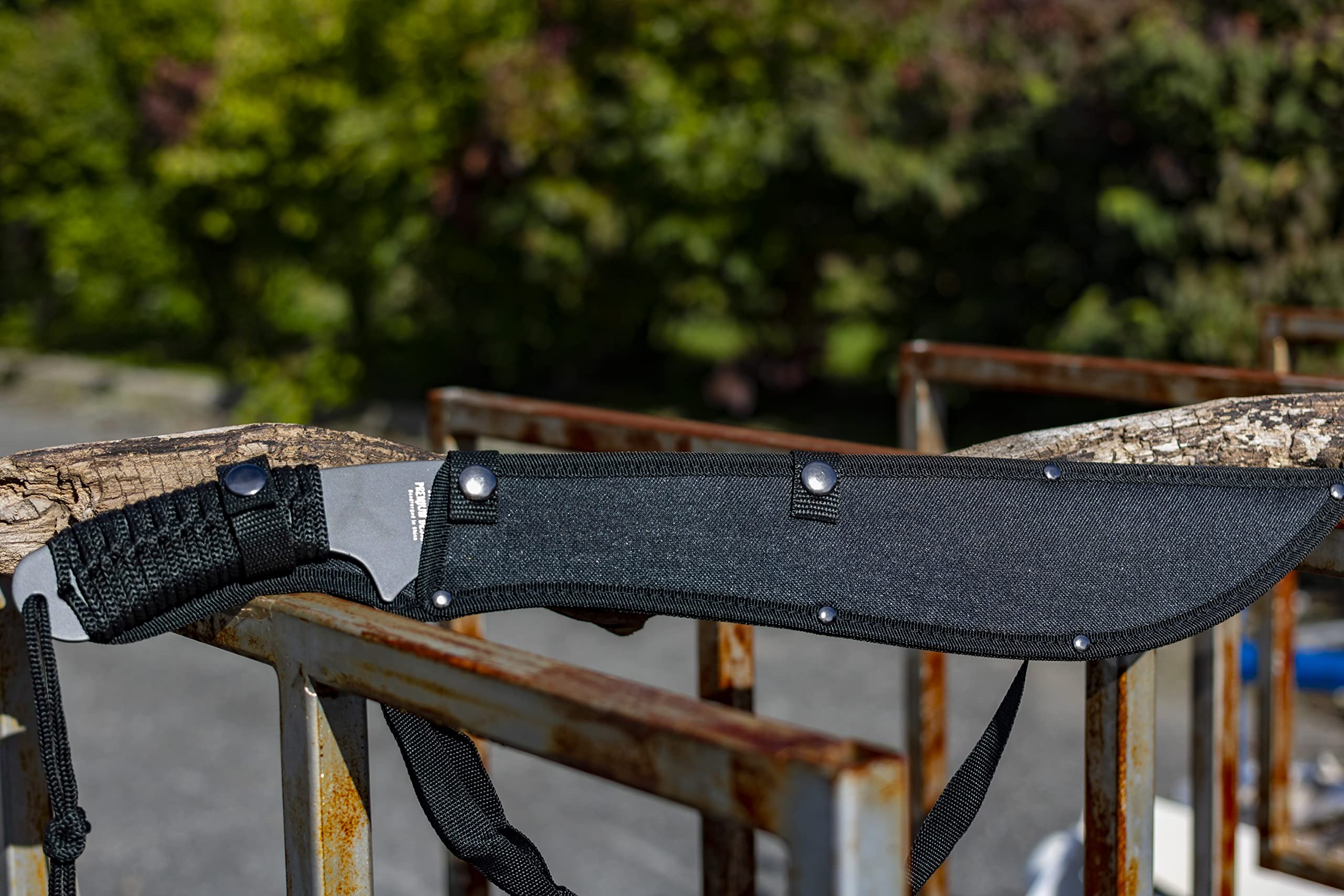 Jungle Master placed beside a ruler showing 21-inch overall length for easy portability