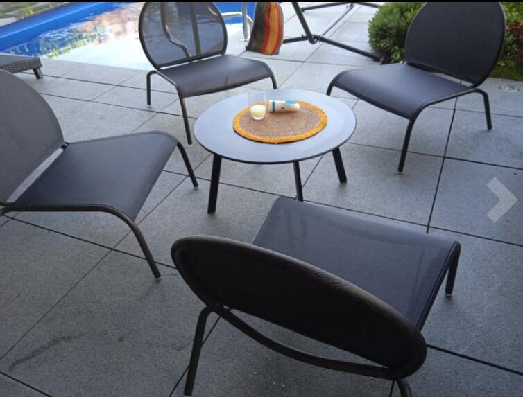 juserox table in balcony setting holding drinks to show outdoor living benefit
