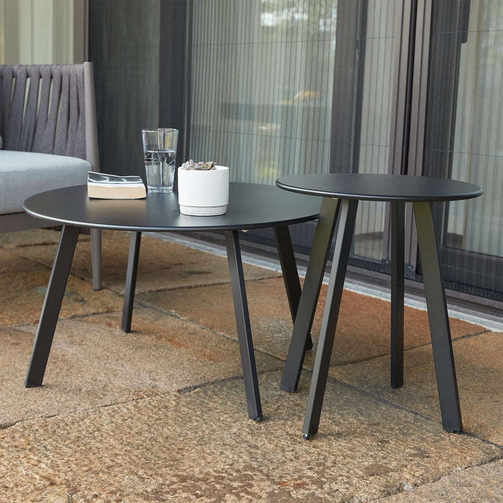 juserox table beside sofa showing size comparison for indoor and outdoor placement