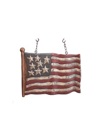 K&K Interiors carved flag arrow close texture showing resin grain and durable painted detail