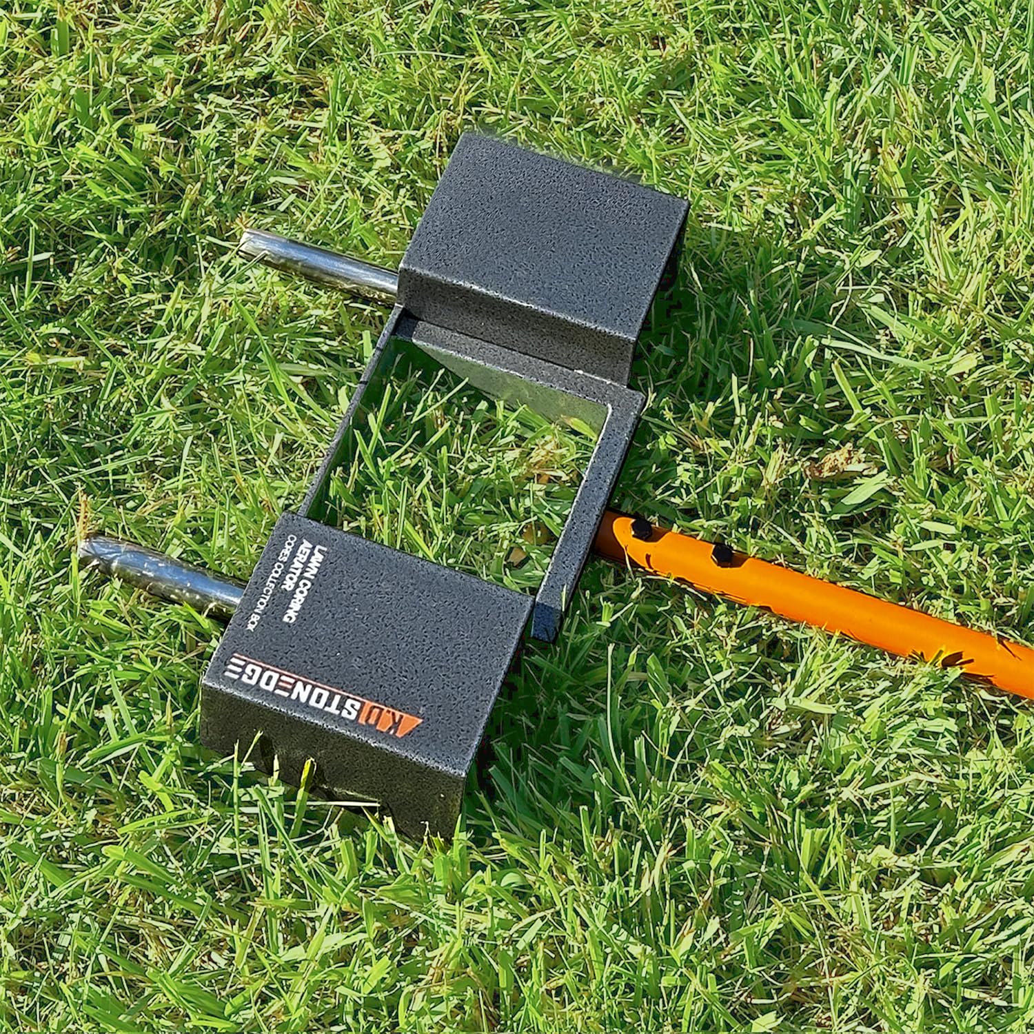 K.D STONEDGE aerator next to hand for scale showing compact, easy-to-handle design