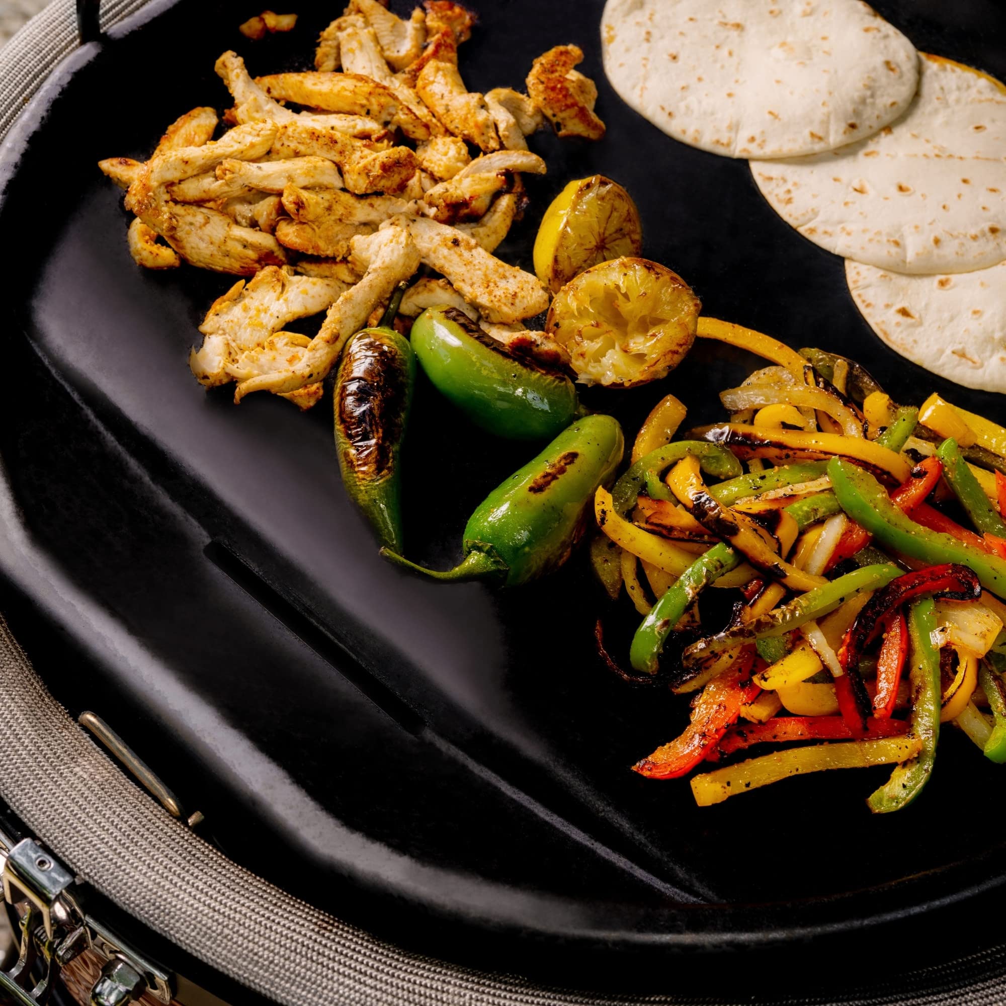 Kamado Joe cooking breakfast on griddle for versatile meal options