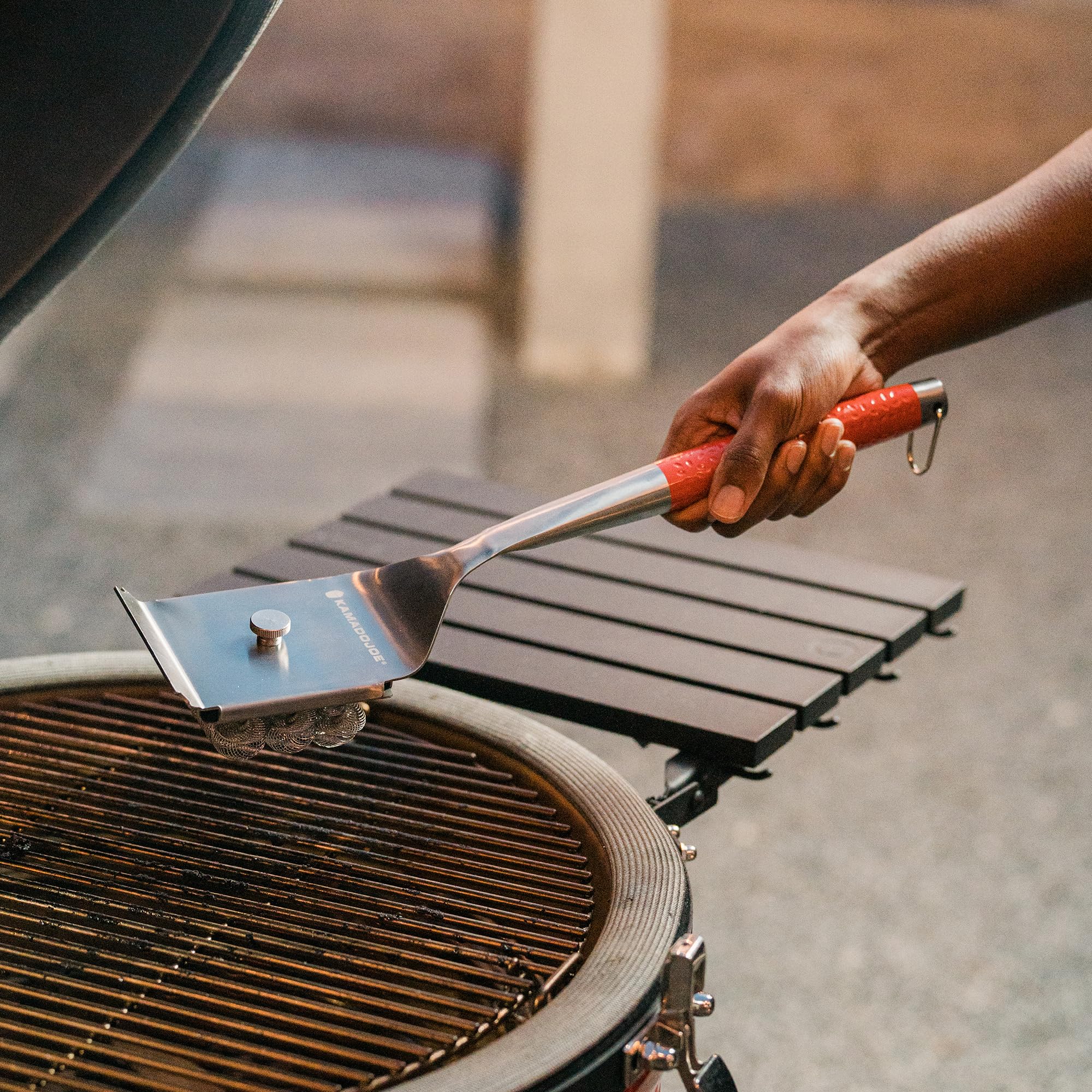 Kamado Joe close-up of stainless-steel coil head illustrating durable bristle-free cleaning
