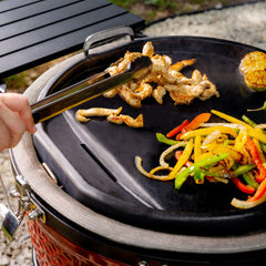 Kamado Joe detail shot of grease drain for easier cleanup