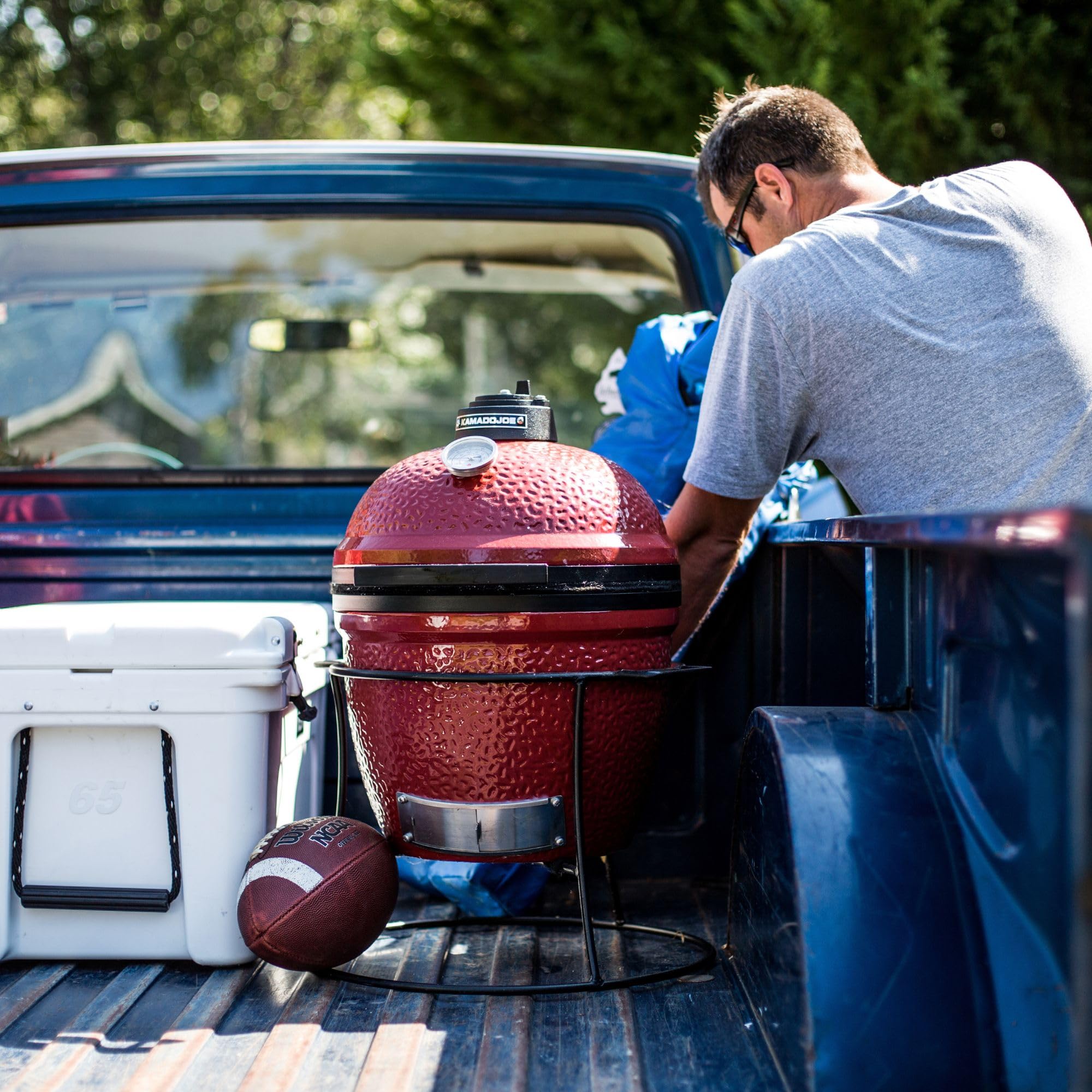 Kamado Joe covered grill loaded in vehicle for safe transport