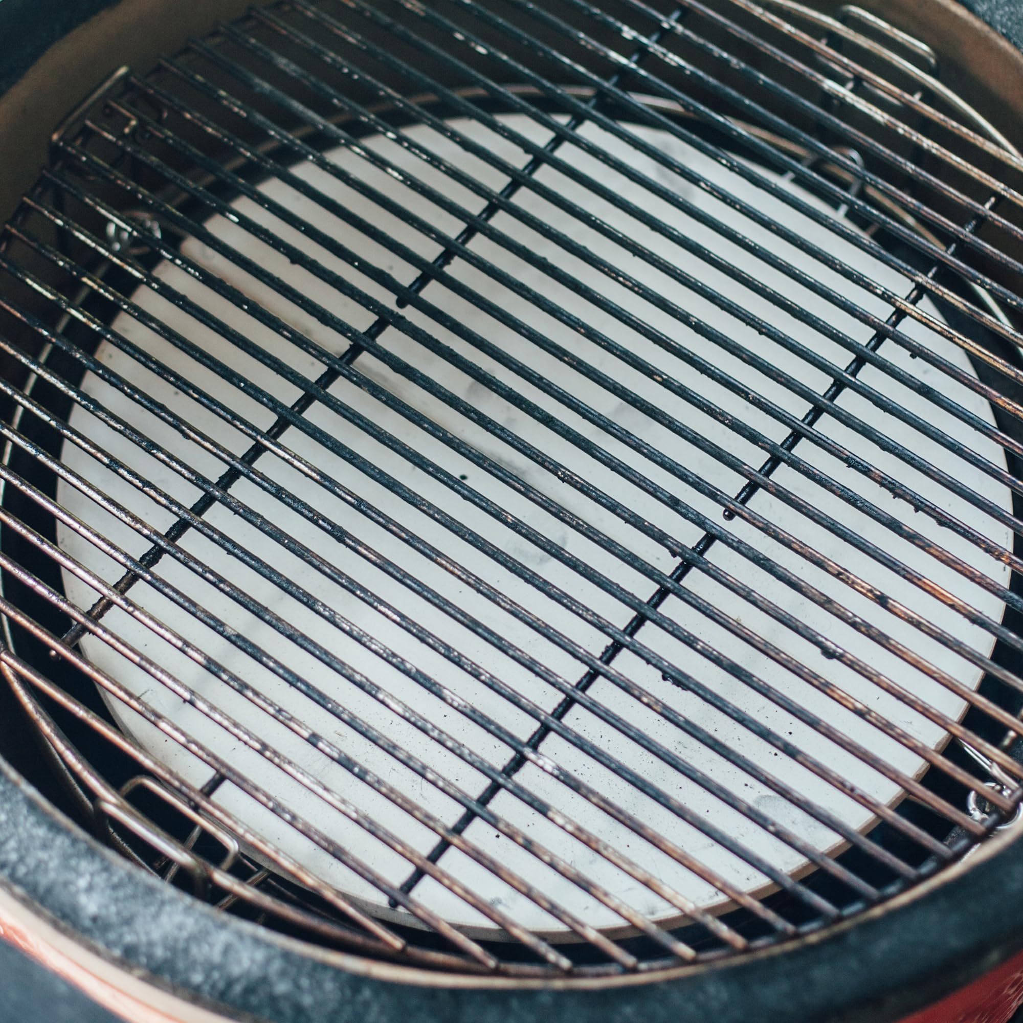 Kamado Joe plates installed in Big Joe demonstrating multi-zone cooking benefits