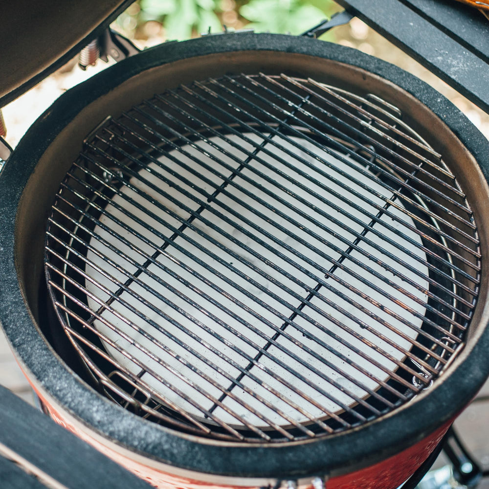 Kamado Joe plates beside grill grate showing size and placement benefit
