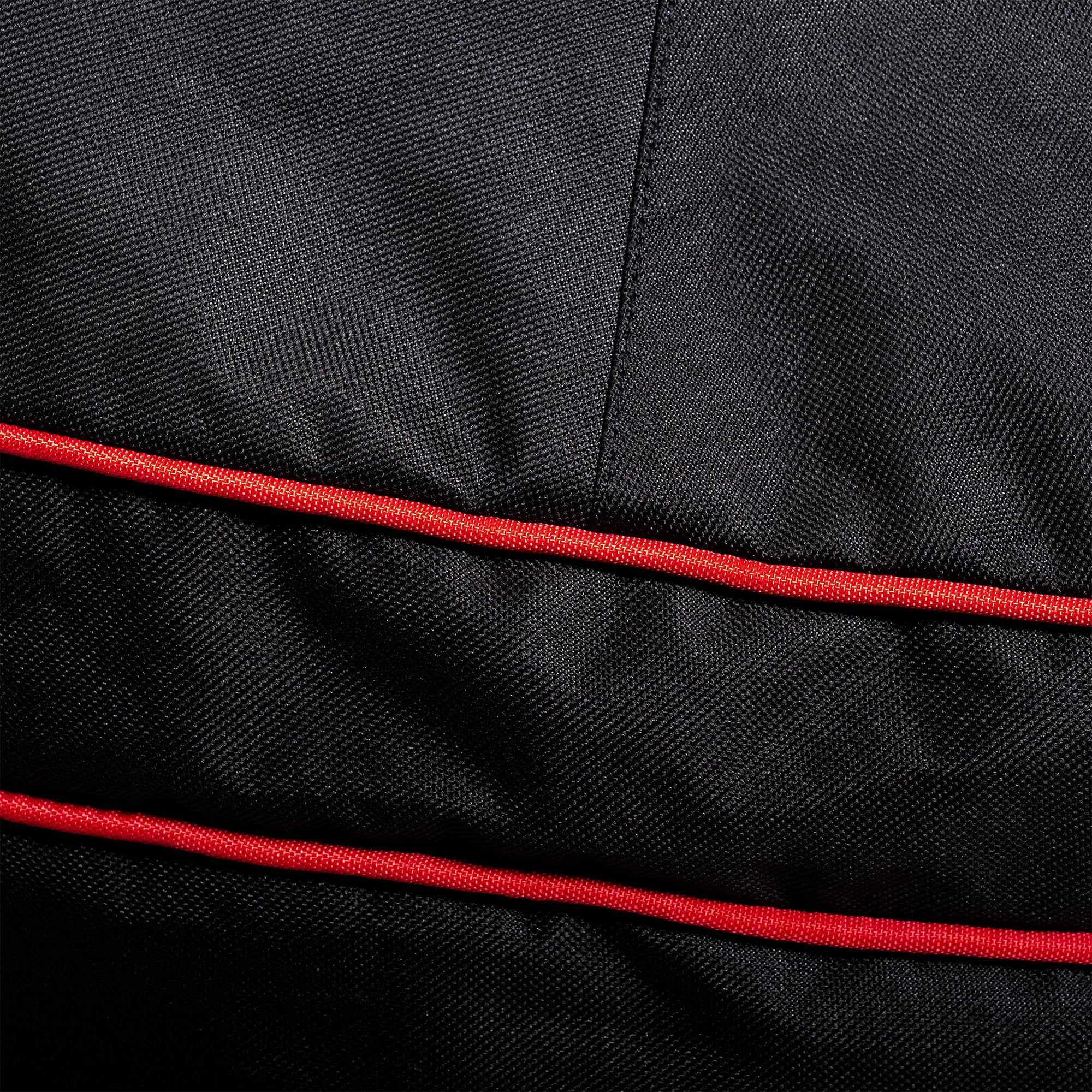 Kamado Joe side view highlighting adjustable buckle keeping cover secure