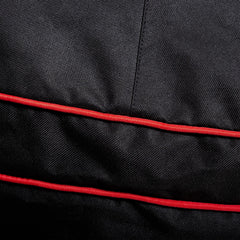 Kamado Joe side view highlighting adjustable buckle keeping cover secure