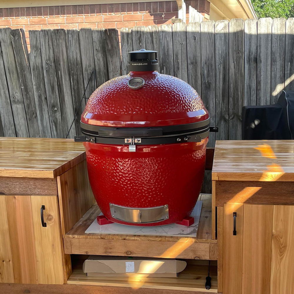 KAMaster four feet supporting grill on outdoor table preventing heat damage
