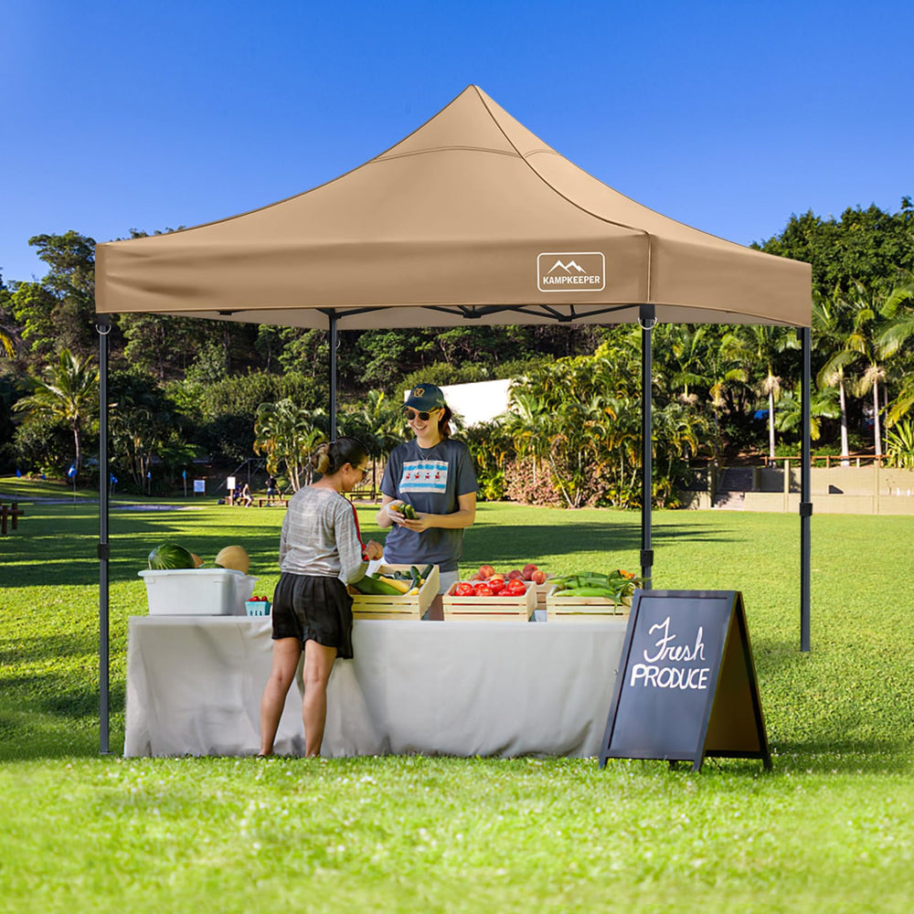 KAMPKEEPER canopy in a market booth setup offering shade and weather protection