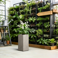 Kante planter with layered greenery inside showing roomy interior that supports healthy root growth