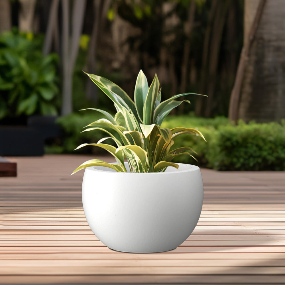 Kante planter styled on patio with plants to show outdoor elegance and scale