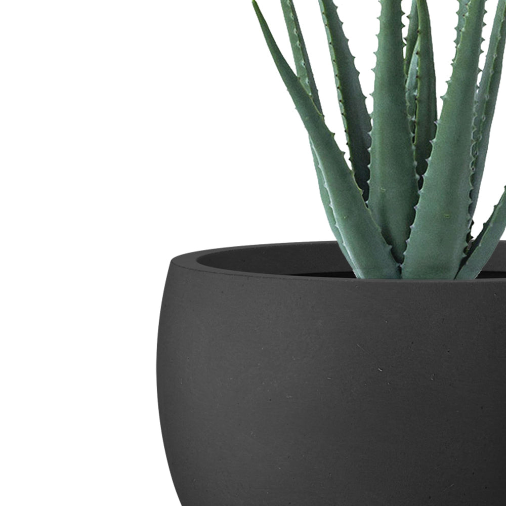 Kante next to chair showing 14-inch scale for proper sizing and placement planning