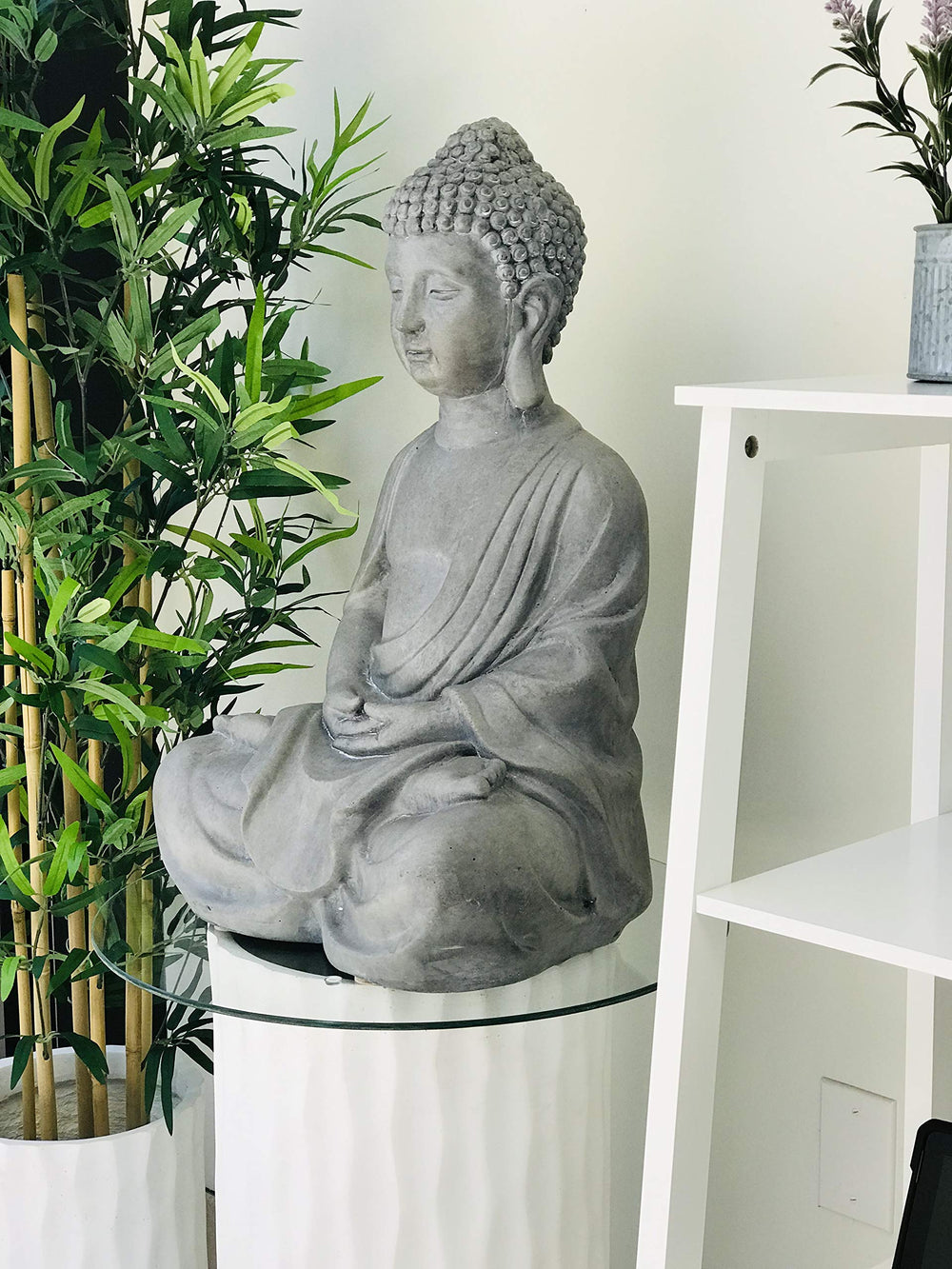Kante statue on balcony illustrating compact footprint and decor versatility