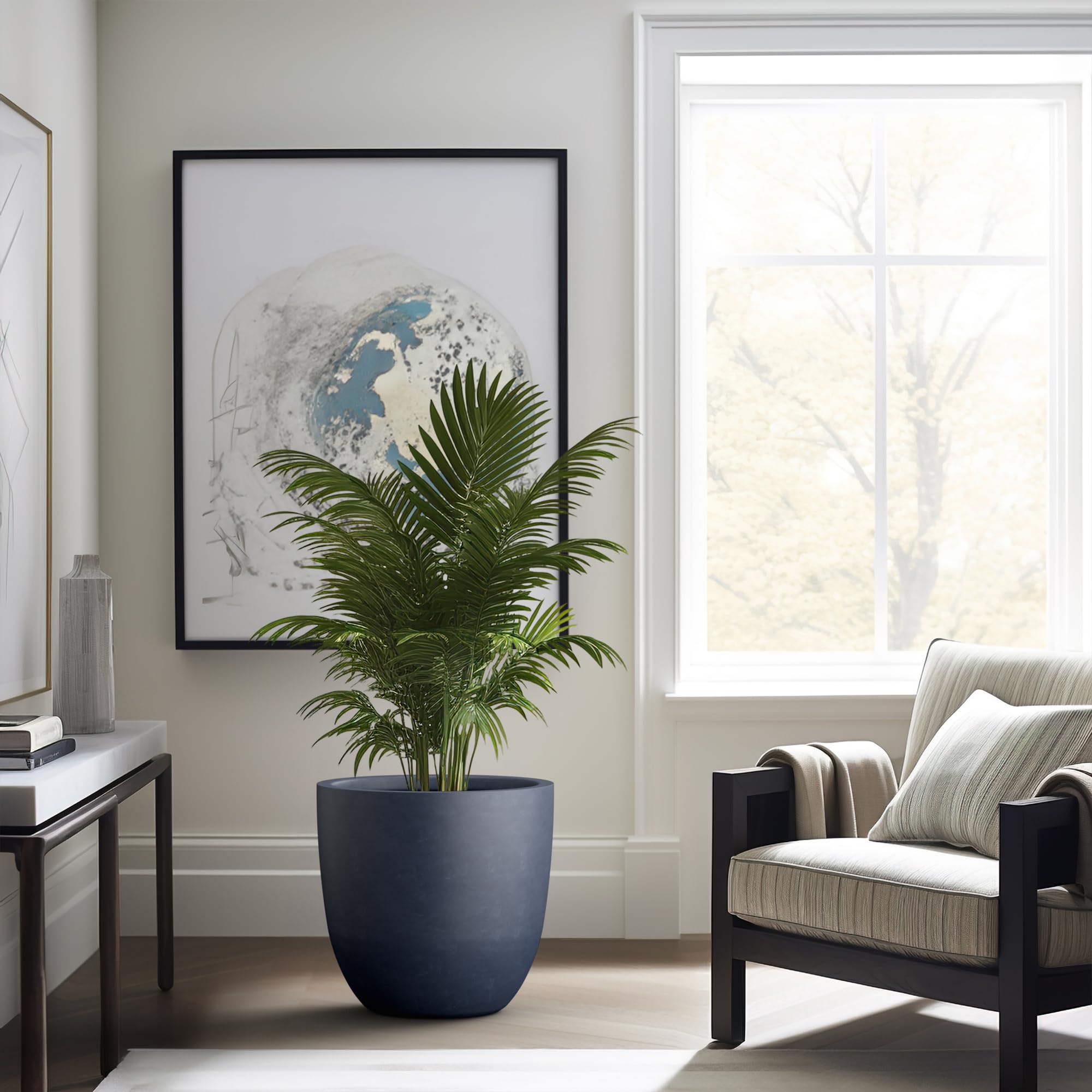 Kante planter on a balcony with ornamental grass offering stylish space-saving greenery