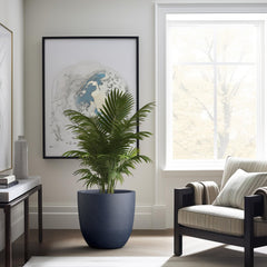 Kante planter on a balcony with ornamental grass offering stylish space-saving greenery