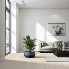 Kante charcoal planter drainage plug detail showing indoor/outdoor water control