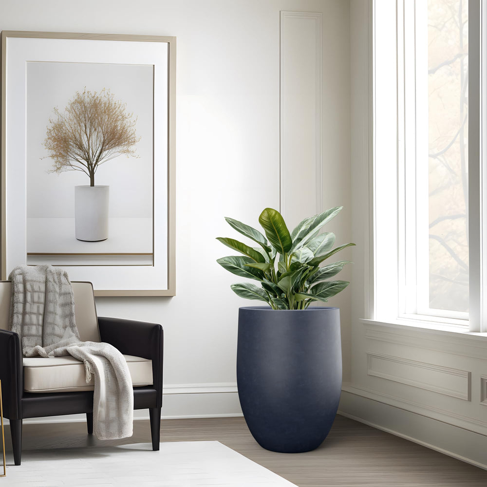 Kante charcoal planter filled with greenery demonstrating generous planting space