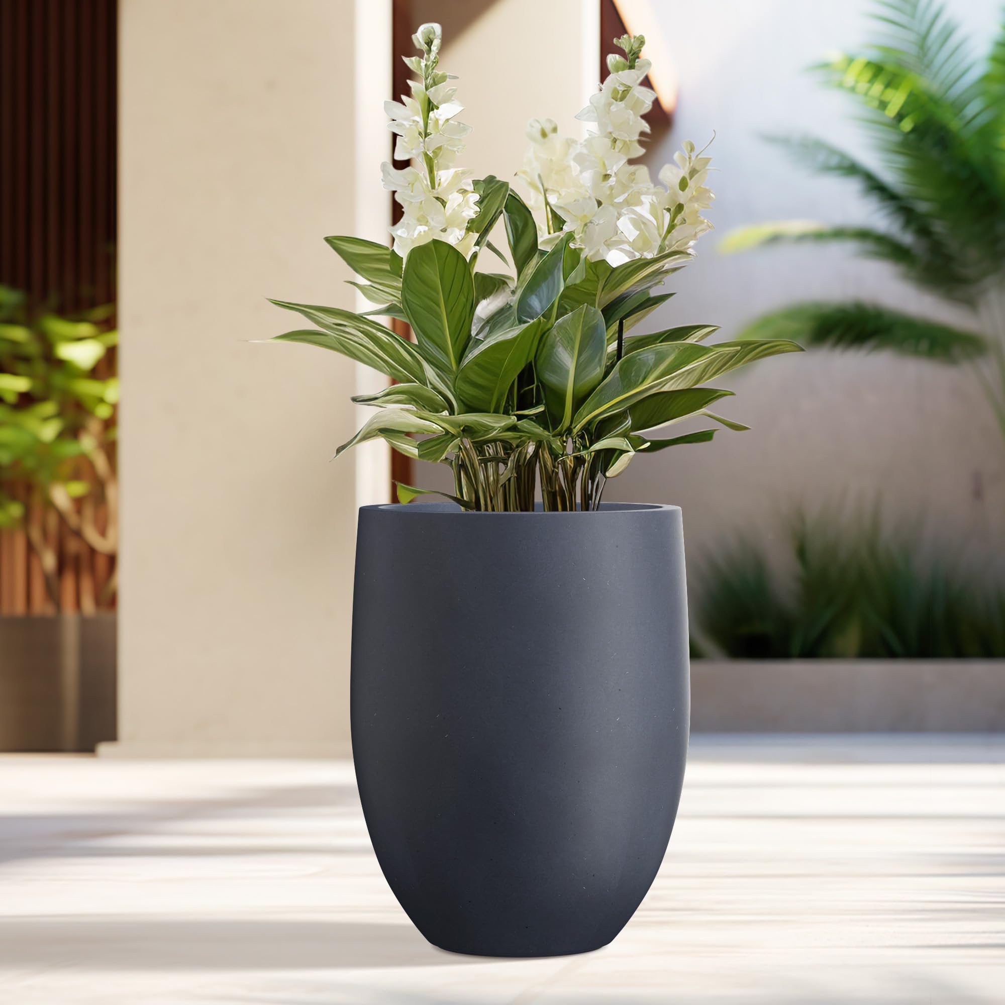 Kante charcoal planter front view showing modern profile and curb appeal