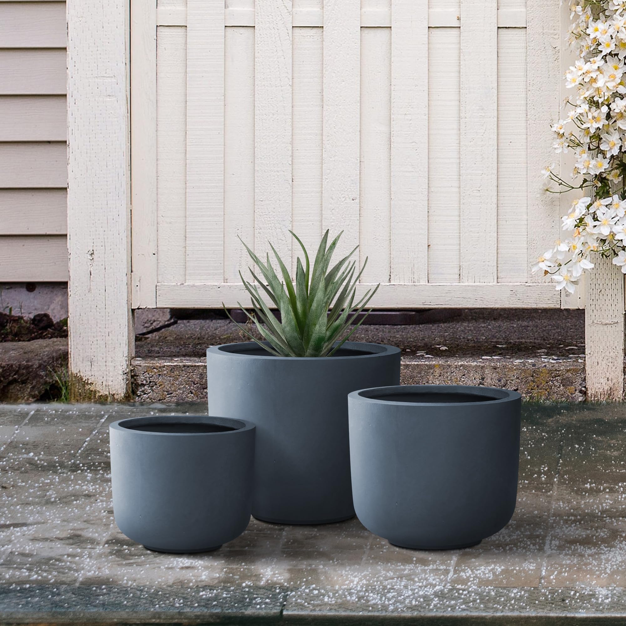Kante planters staged on patio demonstrating weather-resistant benefit