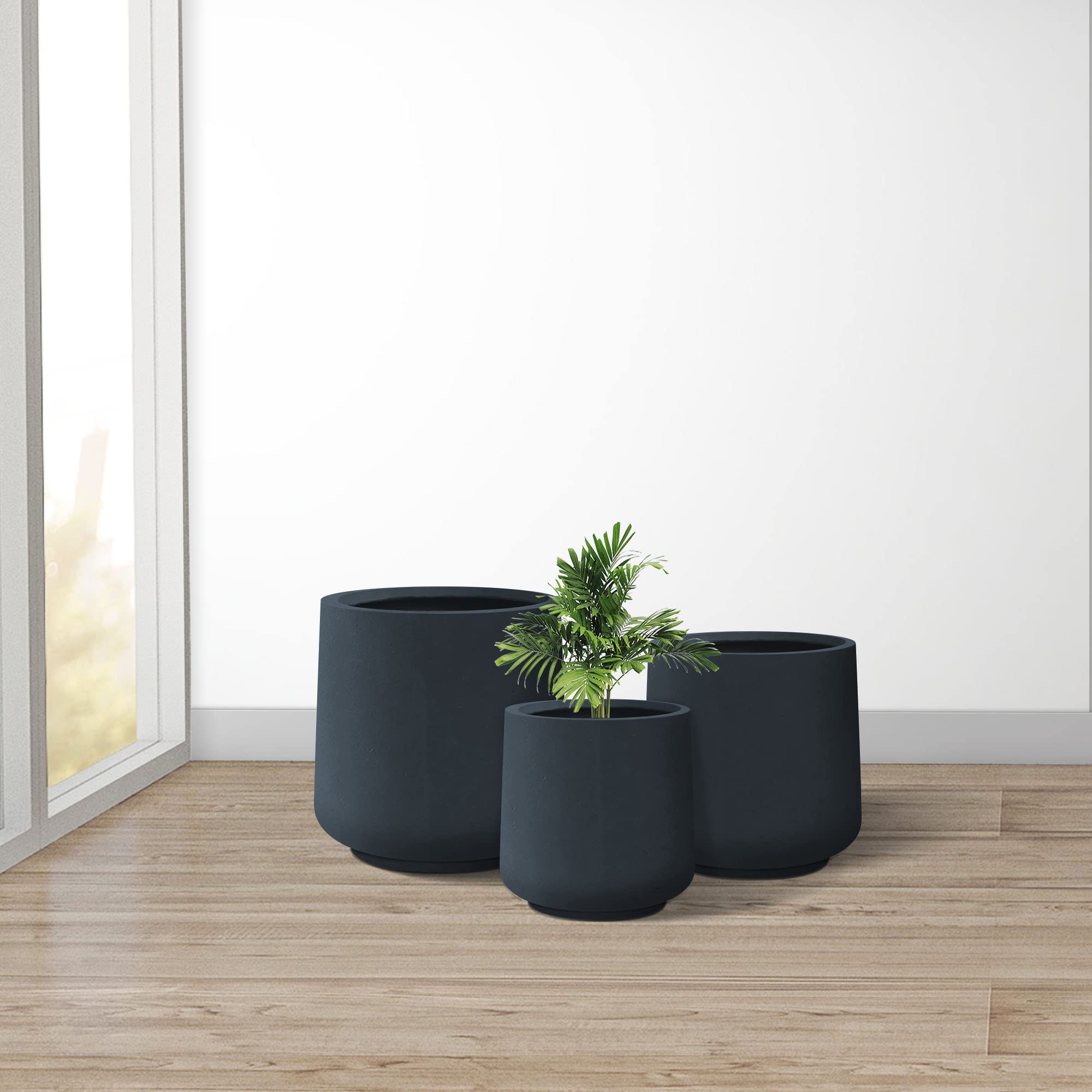 Kante large planter with statement plant demonstrating scale and visual impact