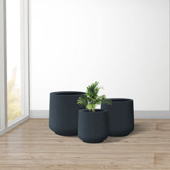 Kante large planter with statement plant demonstrating scale and visual impact