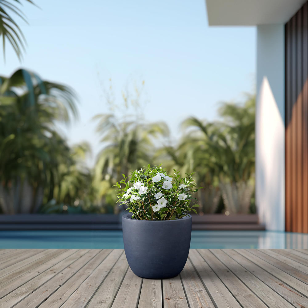 Kante planter styled on porch showing how it enhances outdoor decor