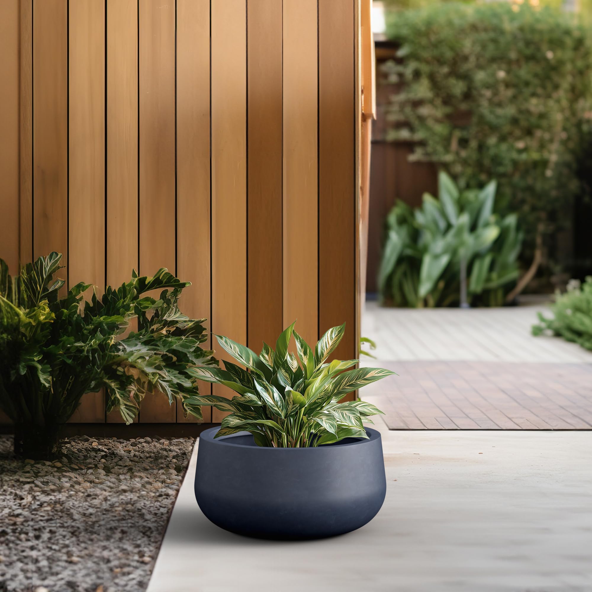Kante charcoal planter with succulent arrangement demonstrating planting possibilities