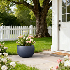 Kante charcoal planter beside chair for scale demonstrating generous 20-inch size