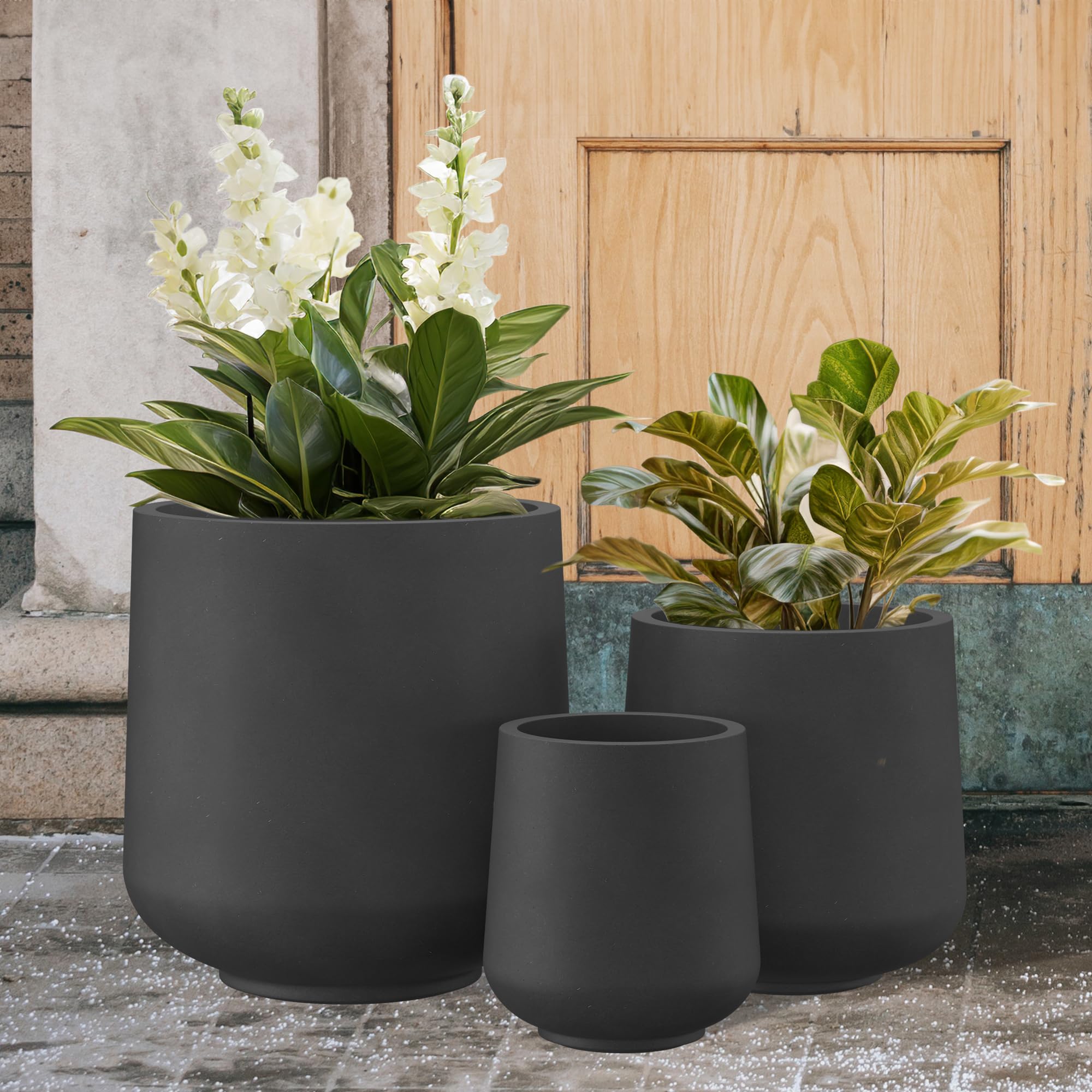Kante planter filled with greenery on patio demonstrating stylish outdoor use