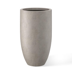 Kante front view of 24 inch round planter shows sculptural height and curb appeal