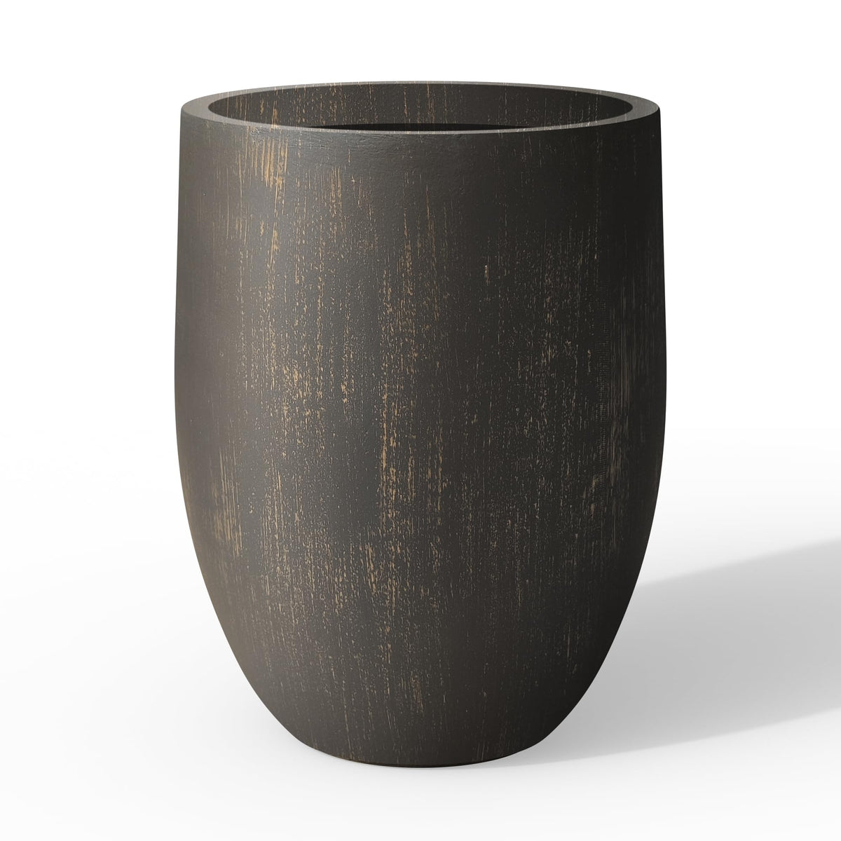 Kante front view of large round planter showing modern shape and curb appeal