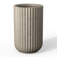Kante front view of weathered concrete column planter showing elegant profile and stability