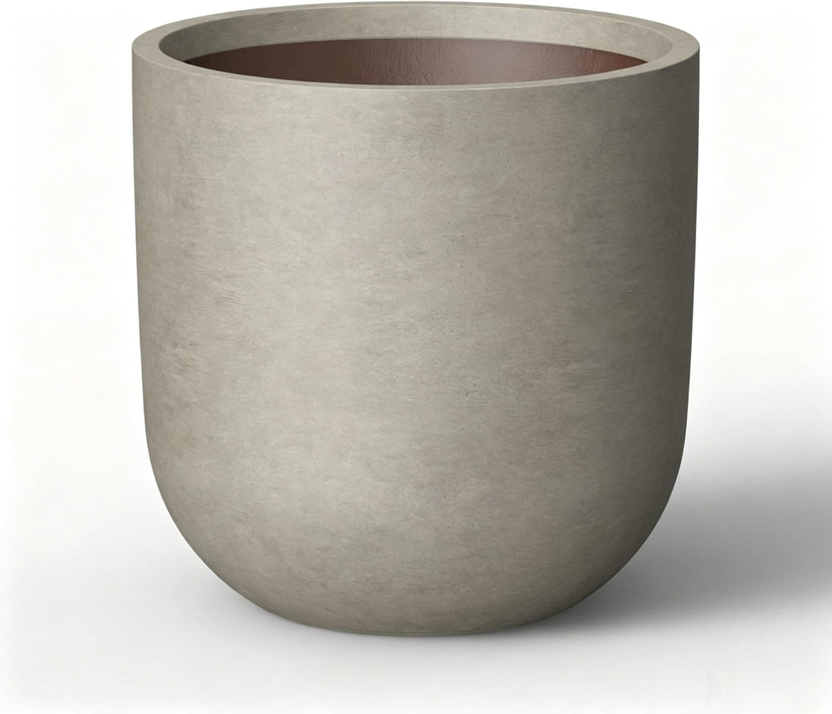 Kante front view of weathered concrete planter showing elegant cylinder shape and durable finish
