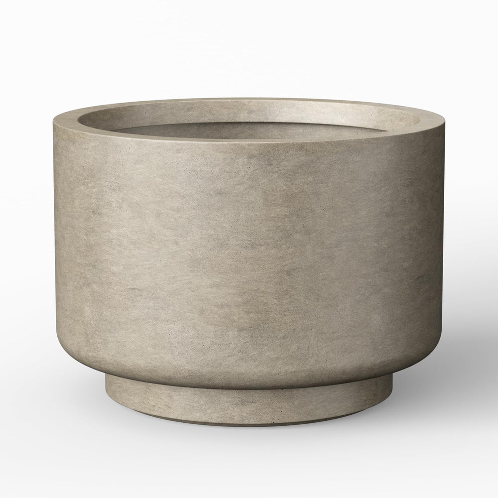 Kante front view of weathered concrete planter showing modern silhouette and durability